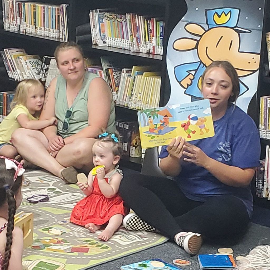 Images of children and families at PIP group connection on July 16, 2025 with beach theme activities