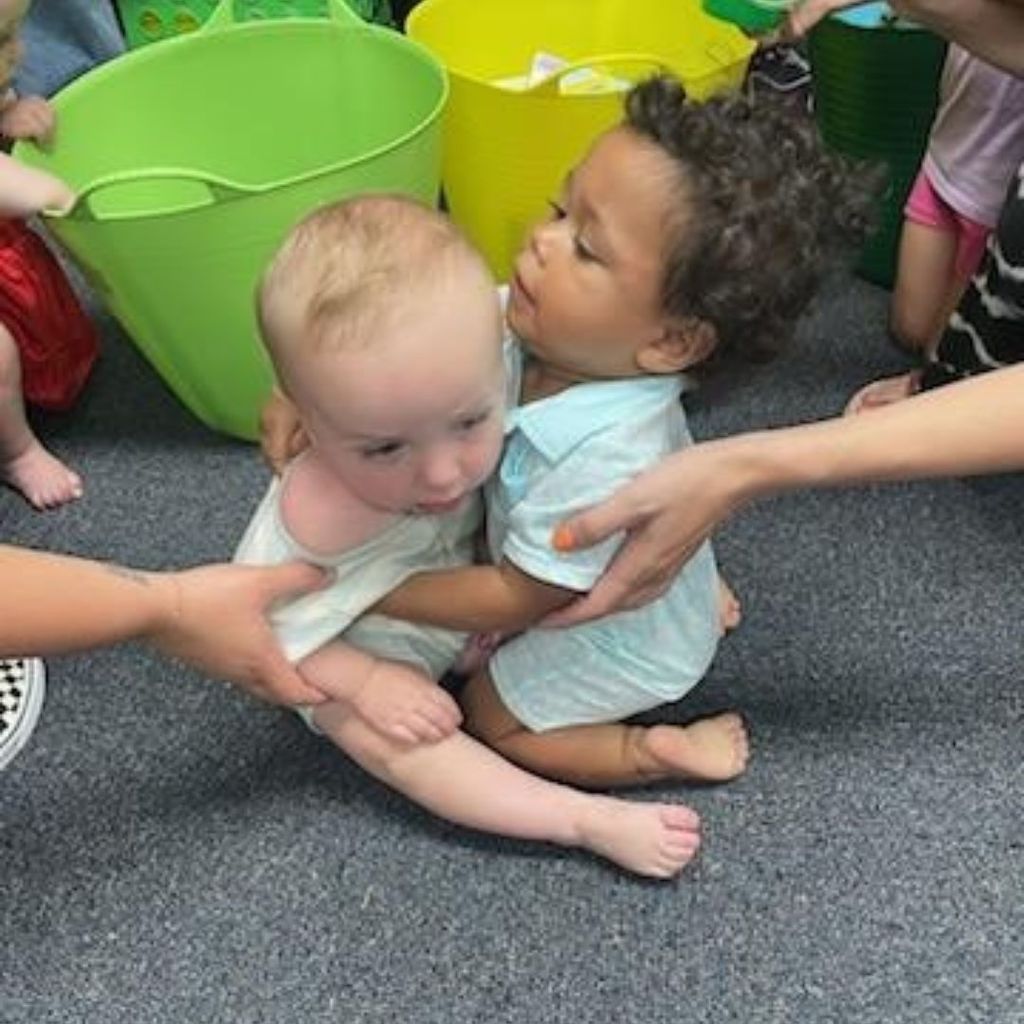 Images of children and families at PIP group connection on July 16, 2025 with beach theme activities