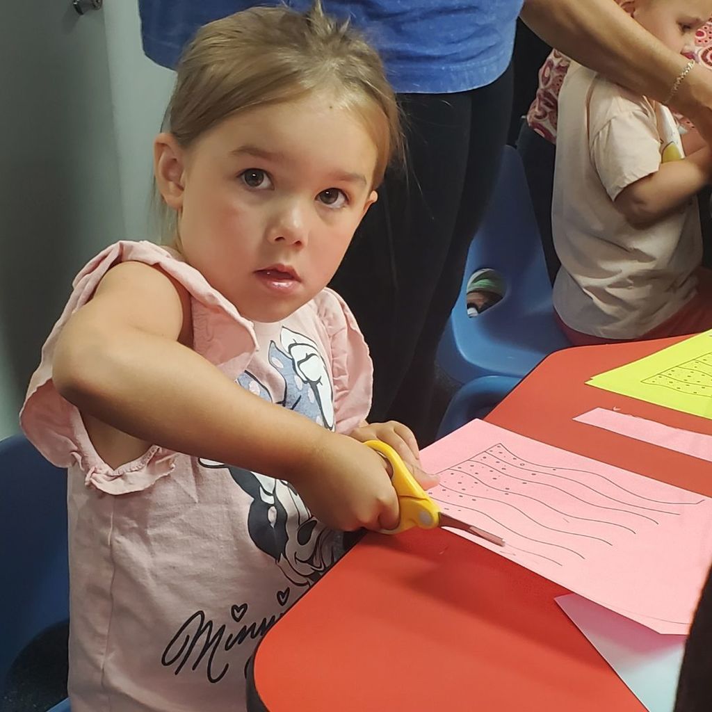 Images of children and families at PIP group connection on July 16, 2025 with beach theme activities