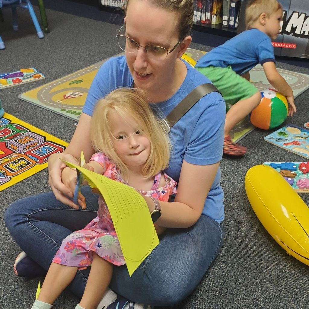 Images of children and families at PIP group connection on July 16, 2025 with beach theme activities