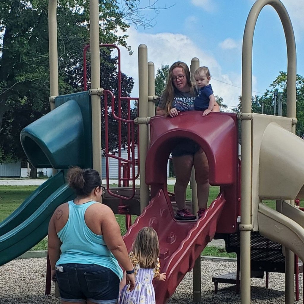 Families on playground during August 2025 partnership in parenting group connection