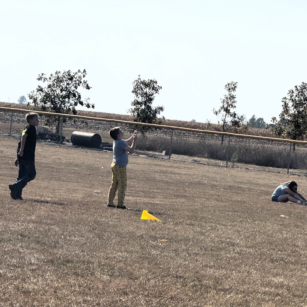 Elementary students fllying kites in PE