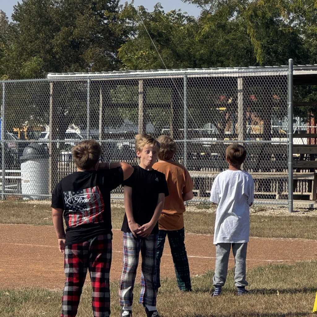 Elementary students fllying kites in PE