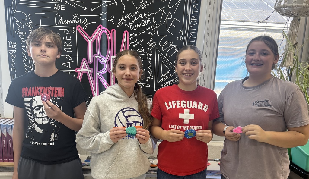 Mrs. Lorenzen's math and science students painting kindness rocks