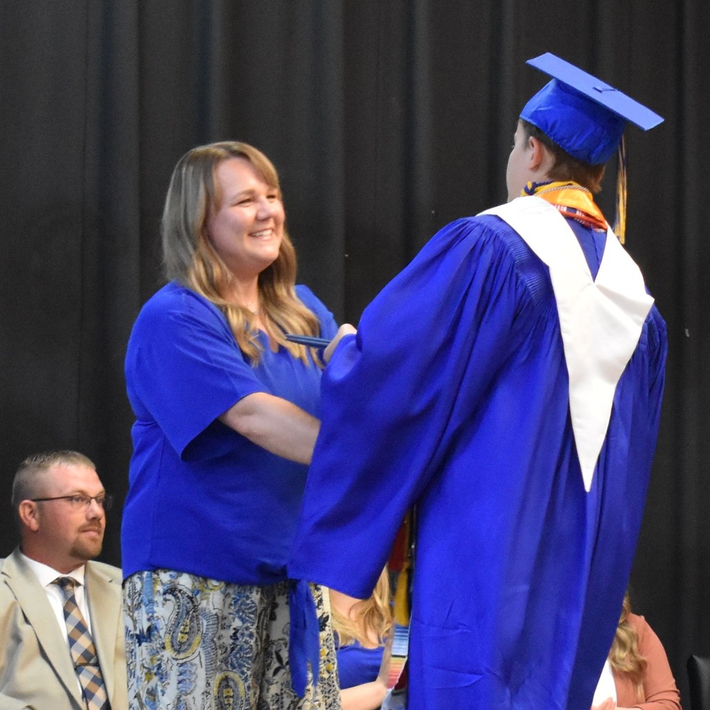 Photos of board members at class of 2025 graduation