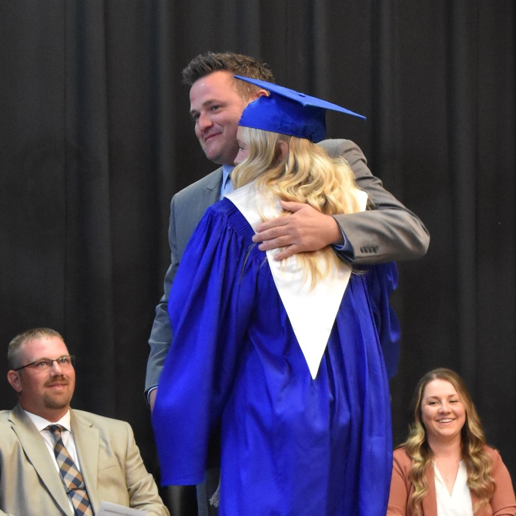 Photos of board members at class of 2025 graduation