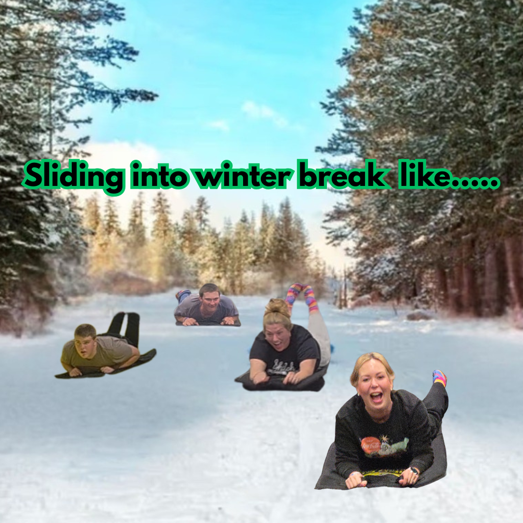 4 Shiloh people sledding down a snowy hill