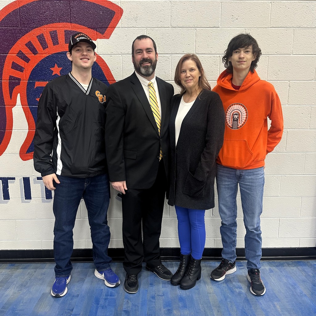 New superintendent Corey White with his wife and 2 sons