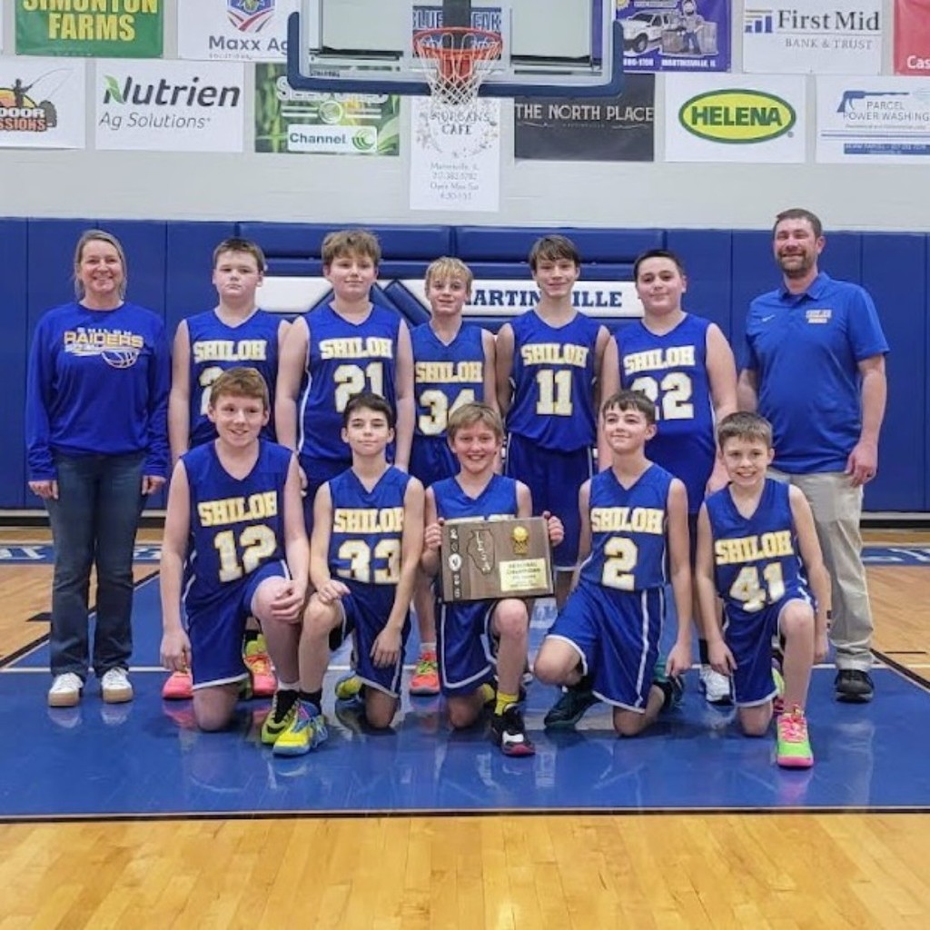 7th grade junior high boys basketball with regional plaque