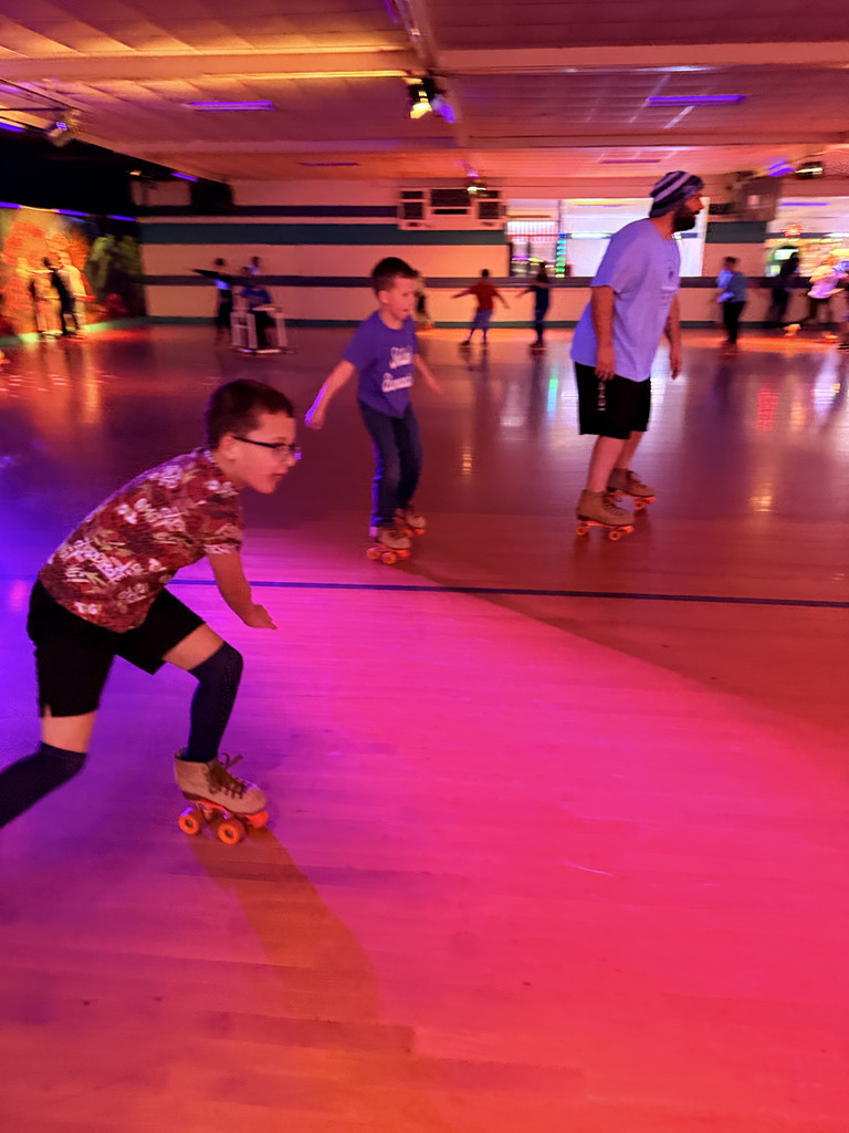 Elementary students roller skating