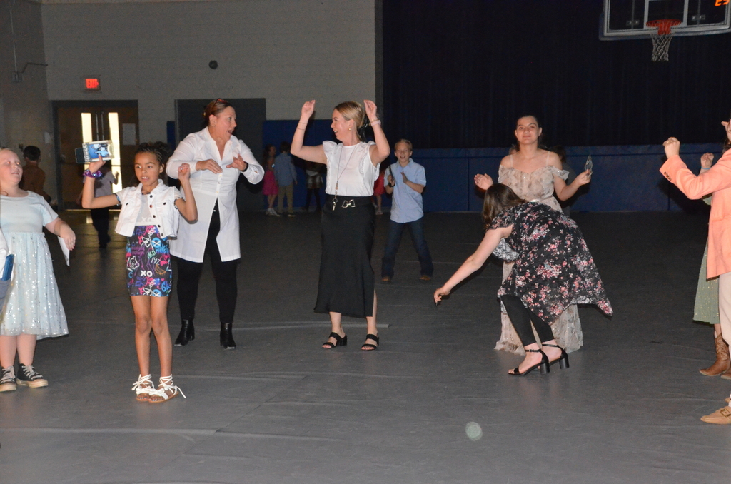 Images of students dancing at the 2025 Dine and Dance