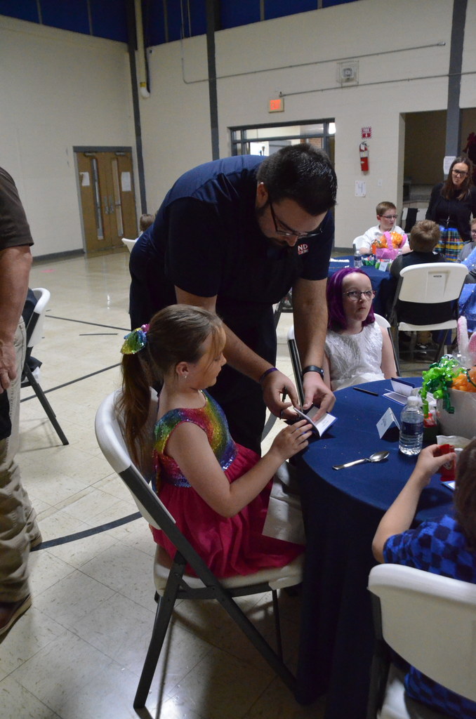 Images of students eating a formal dinner at the 2025 Dine and Dance