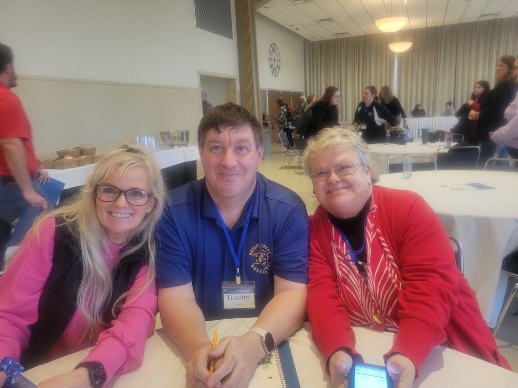 Photo of Mrs. Lorenzen, Mr. Hendershot, and Ms. Harper at the 2026 EIU Math Conference