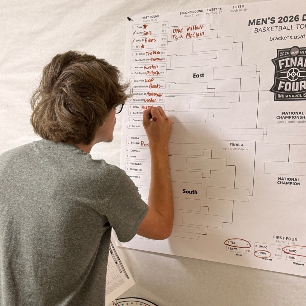 Images of seniors filling out March Madness brackets