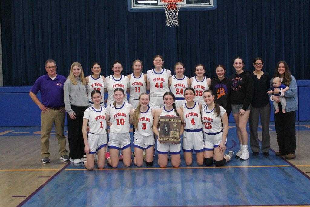 Photo of the Tri-county Girls Basketball team with players and coaches