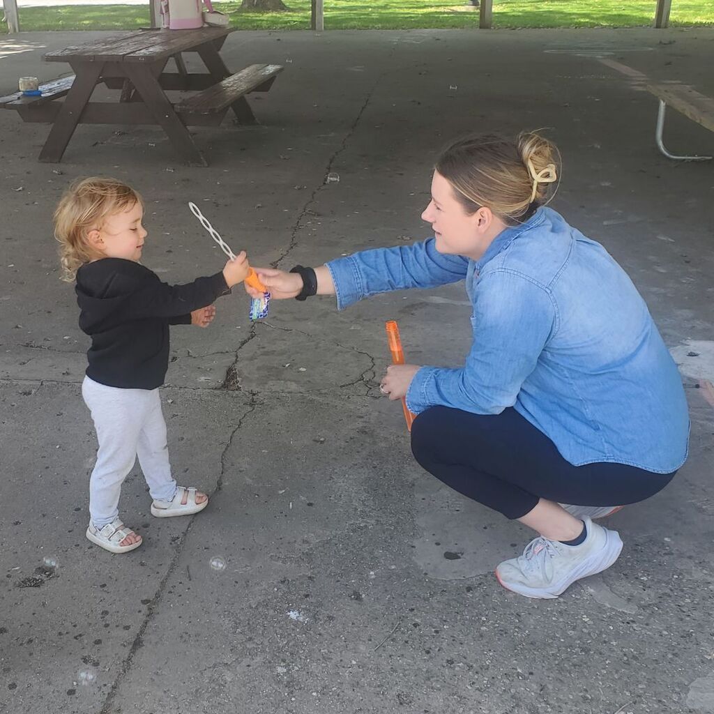 Photos of toddlers and familes on a playground for the May Partnership-in-Parenting group connection