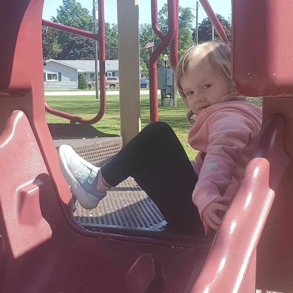 Photos of toddlers and familes on a playground for the May Partnership-in-Parenting group connection