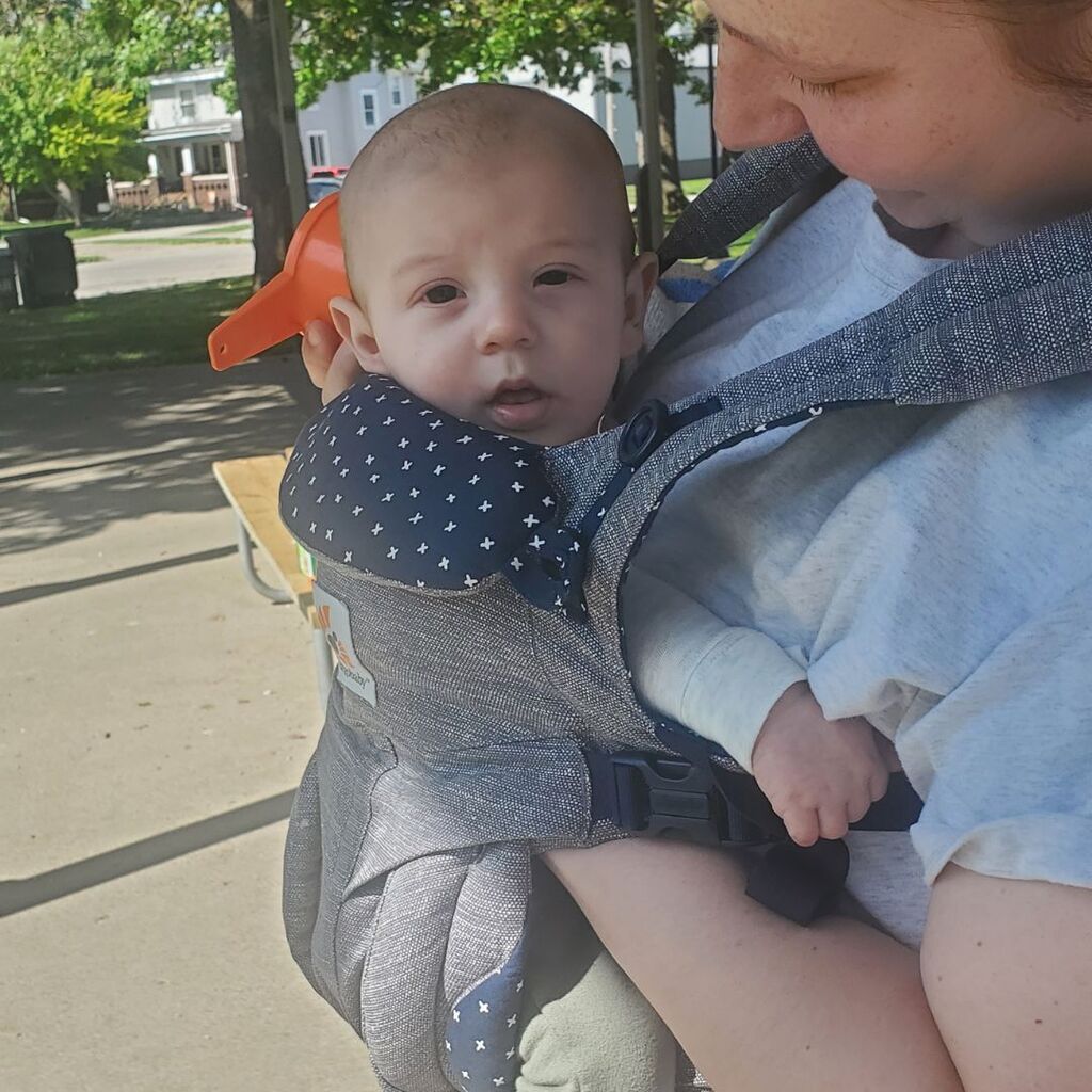 Photos of toddlers and familes on a playground for the May Partnership-in-Parenting group connection