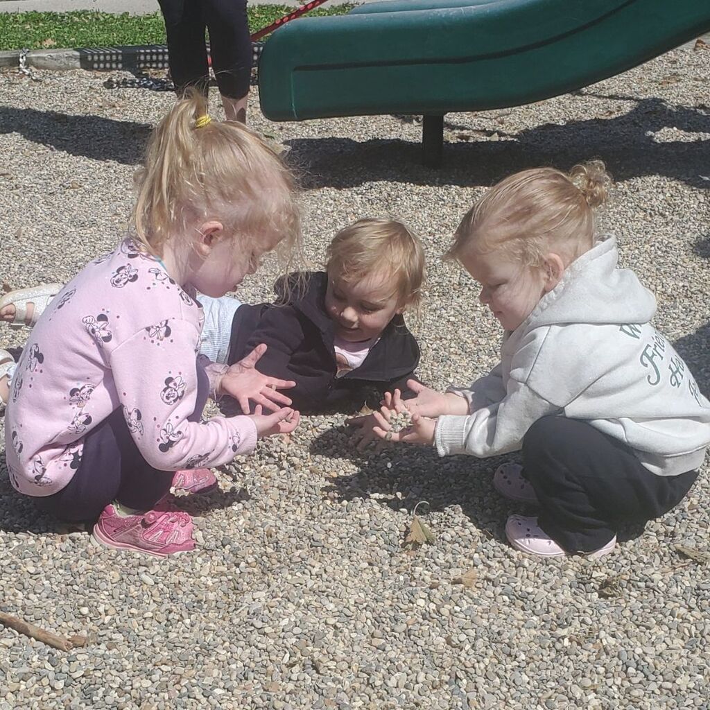 Photos of toddlers and familes on a playground for the May Partnership-in-Parenting group connection