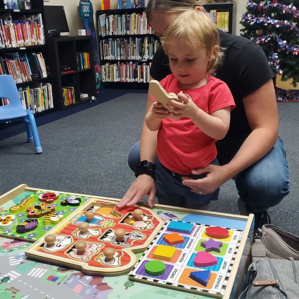 Toddlers and families participating in activities at the June 2026 Partnership in Parenting group connection