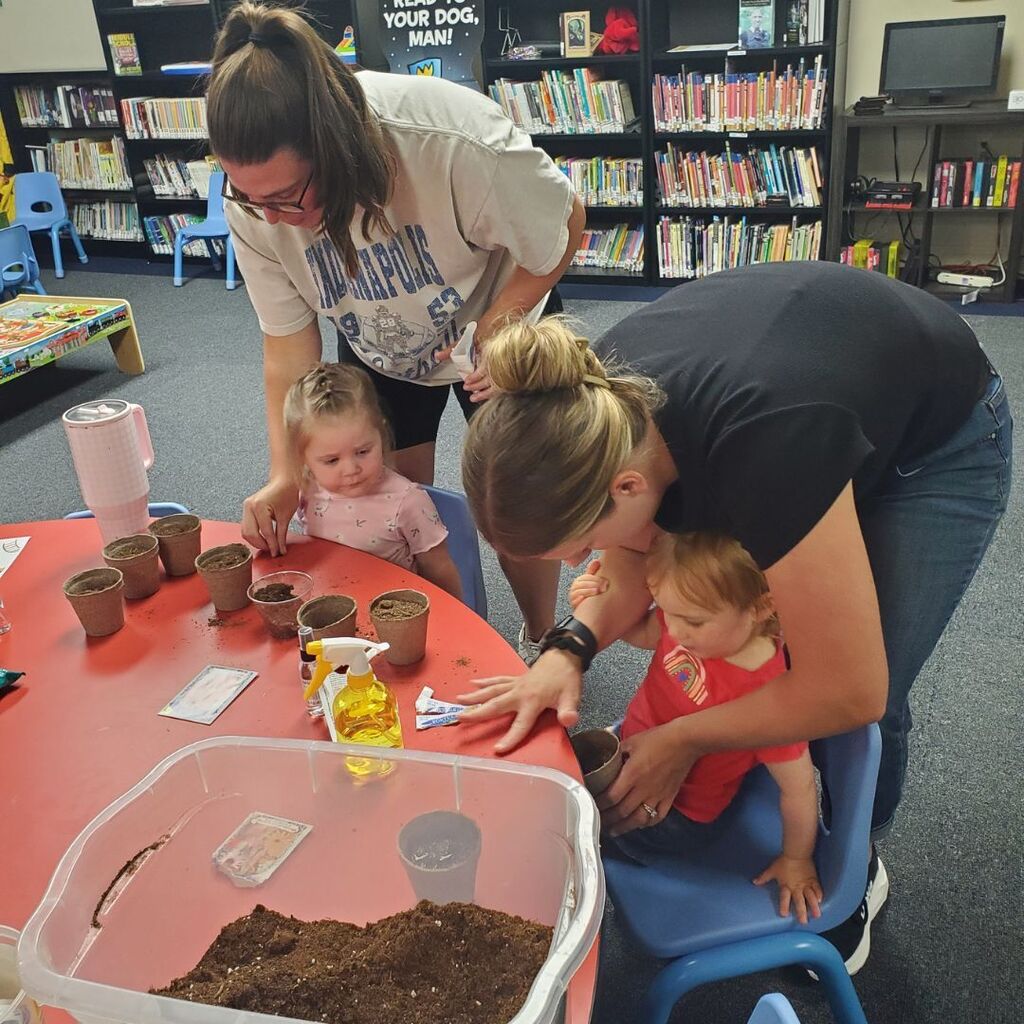Toddlers and families participating in activities at the June 2026 Partnership in Parenting group connection