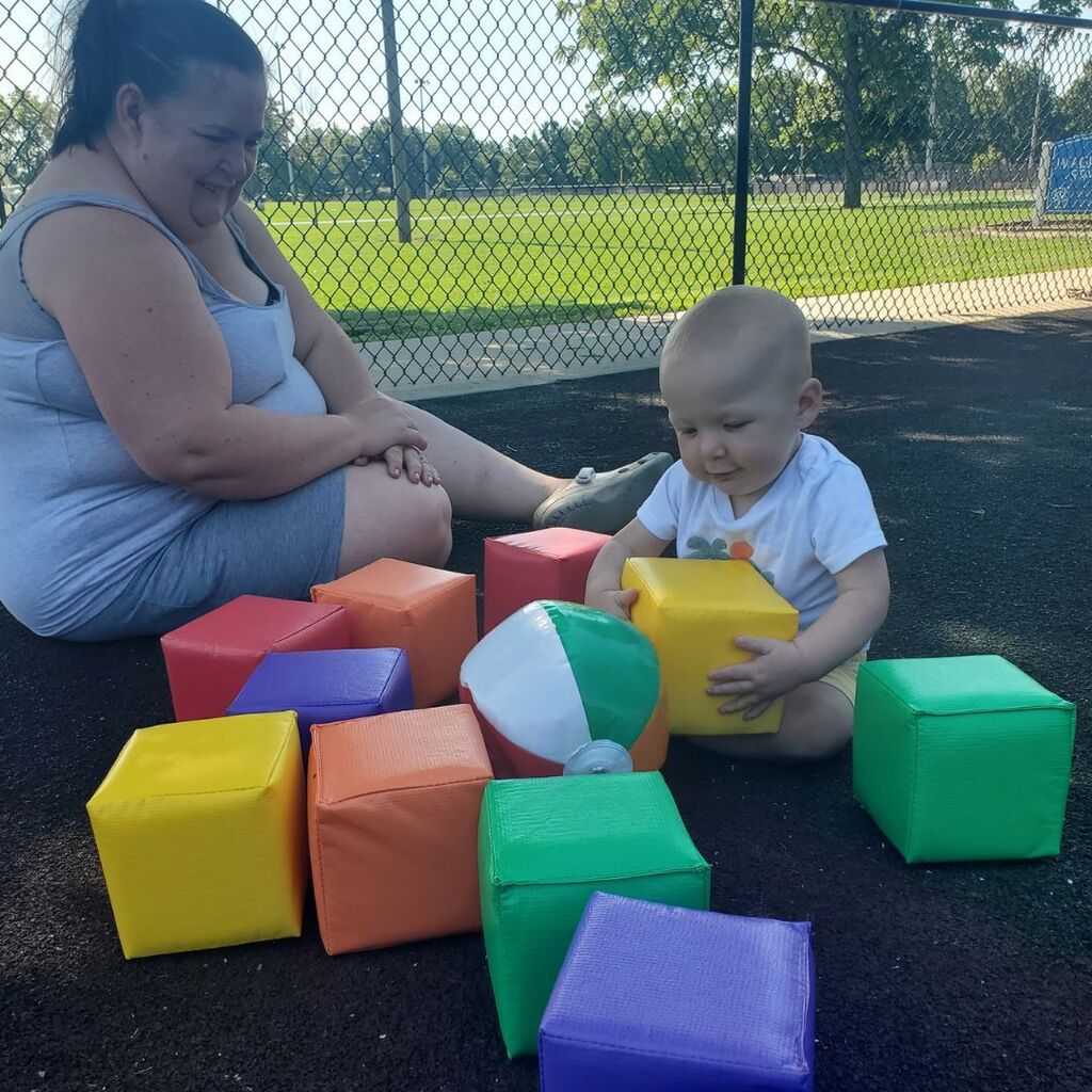Toddlers and families participating in activities at the June 2026 Partnership in Parenting group connection