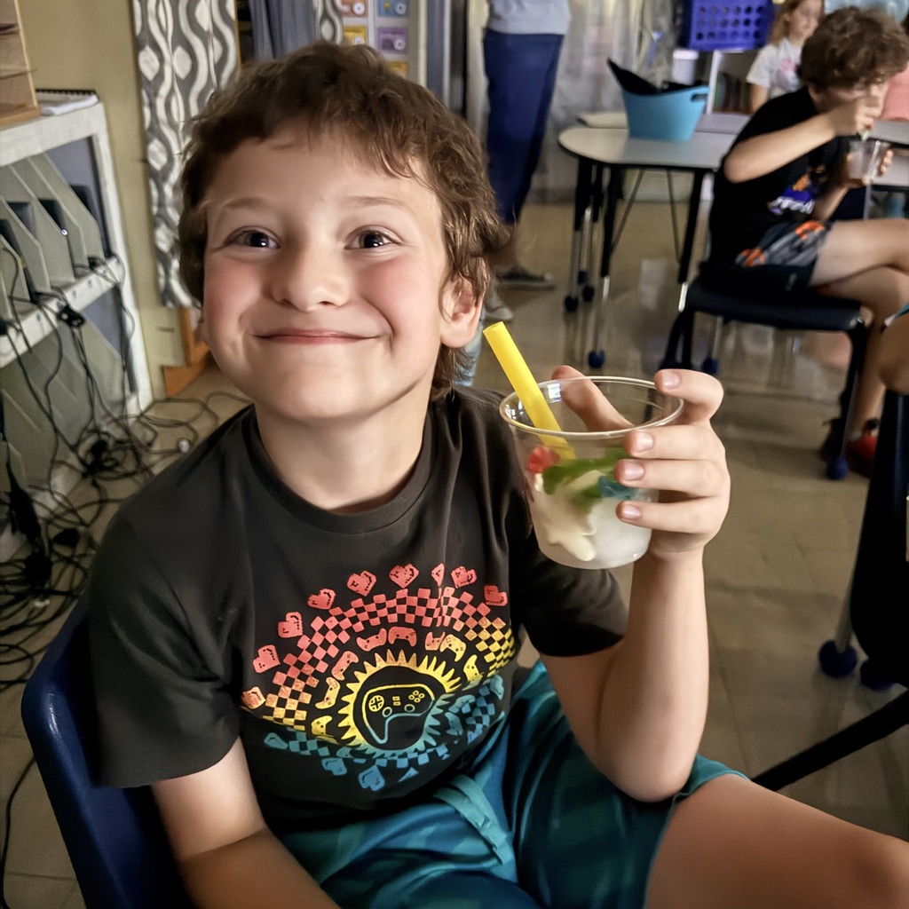 Pictures of 3rd grade students drinking slushies to celebrate doing a great job on MAP testing