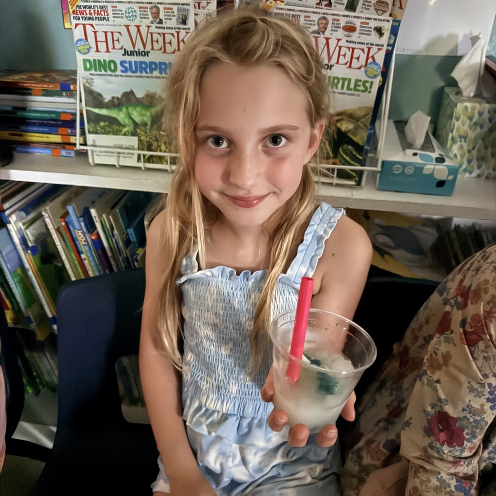 Pictures of 3rd grade students drinking slushies to celebrate doing a great job on MAP testing