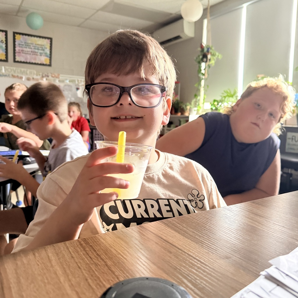 Pictures of 3rd grade students drinking slushies to celebrate doing a great job on MAP testing
