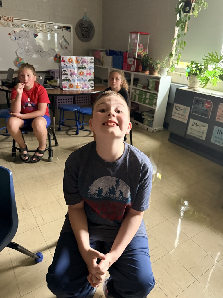 Pictures of 3rd grade students drinking slushies to celebrate doing a great job on MAP testing