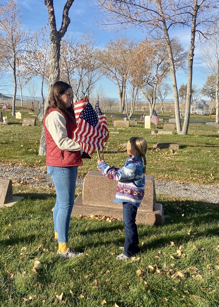 First Graders Honoring our local veterans at the Shoshoni Cemetery