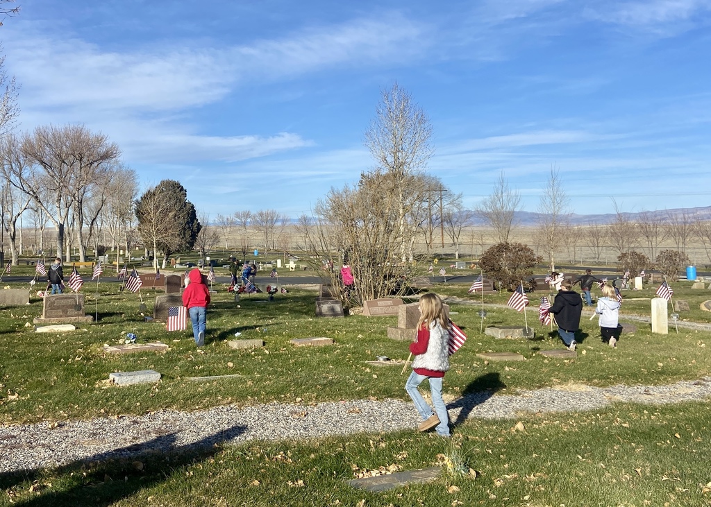 First Graders Honoring our local veterans at the Shoshoni Cemetery