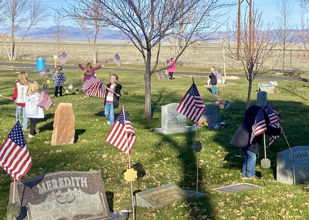 First Graders Honoring our local veterans at the Shoshoni Cemetery