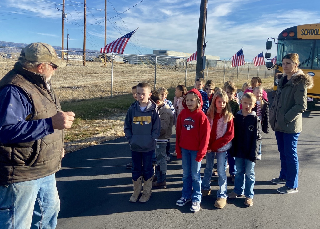 First Graders Honoring our local veterans at the Shoshoni Cemetery
