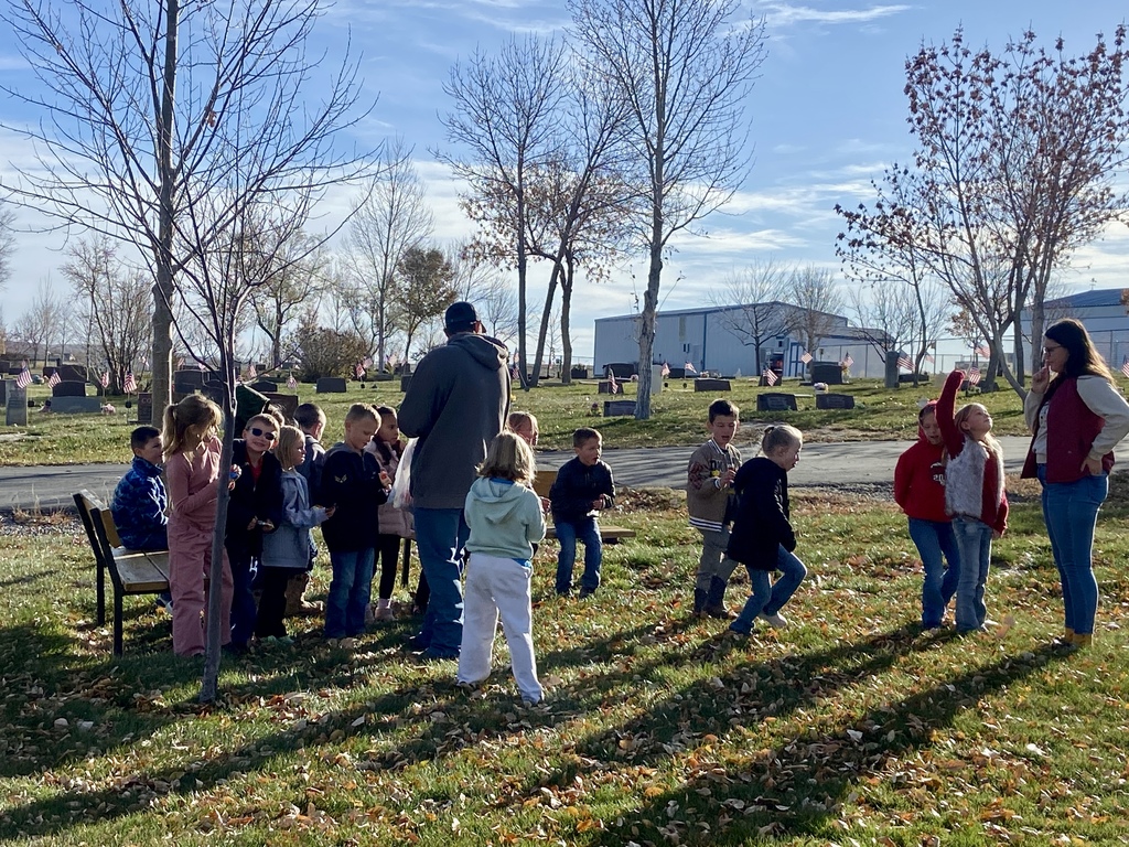 First Graders Honoring our local veterans at the Shoshoni Cemetery