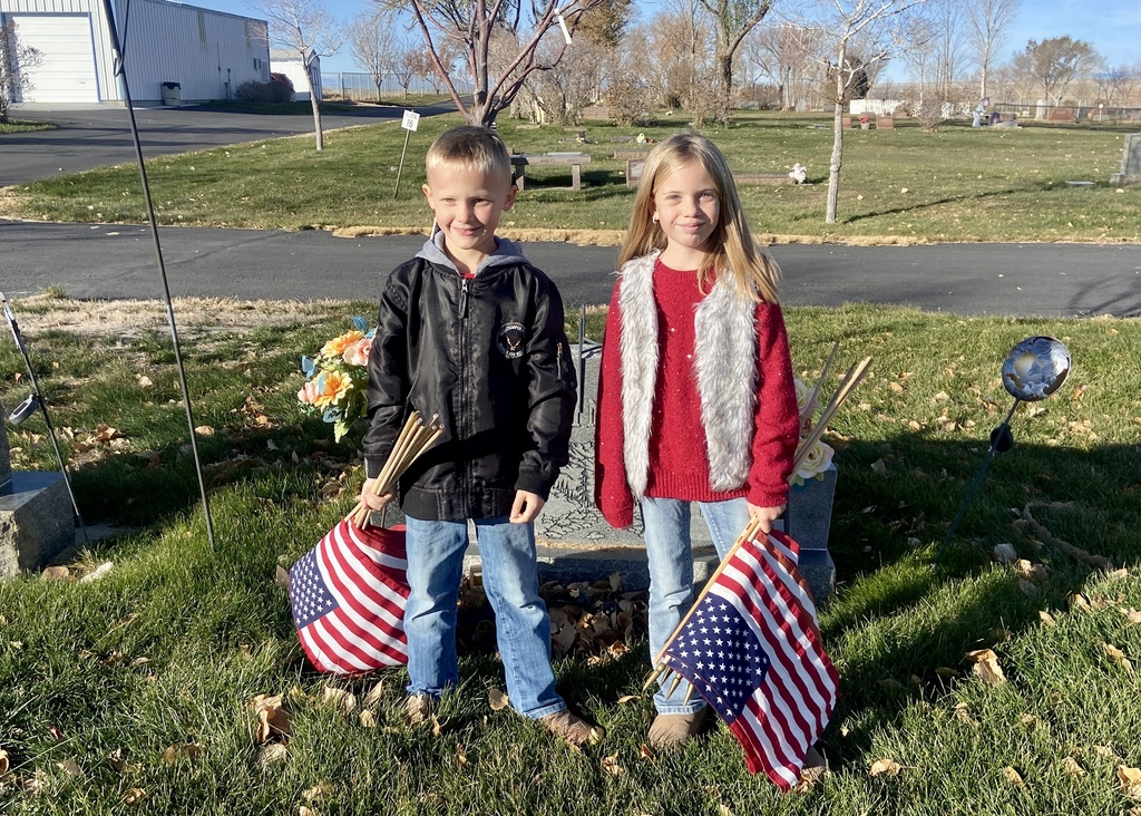 First Graders Honoring our local veterans at the Shoshoni Cemetery