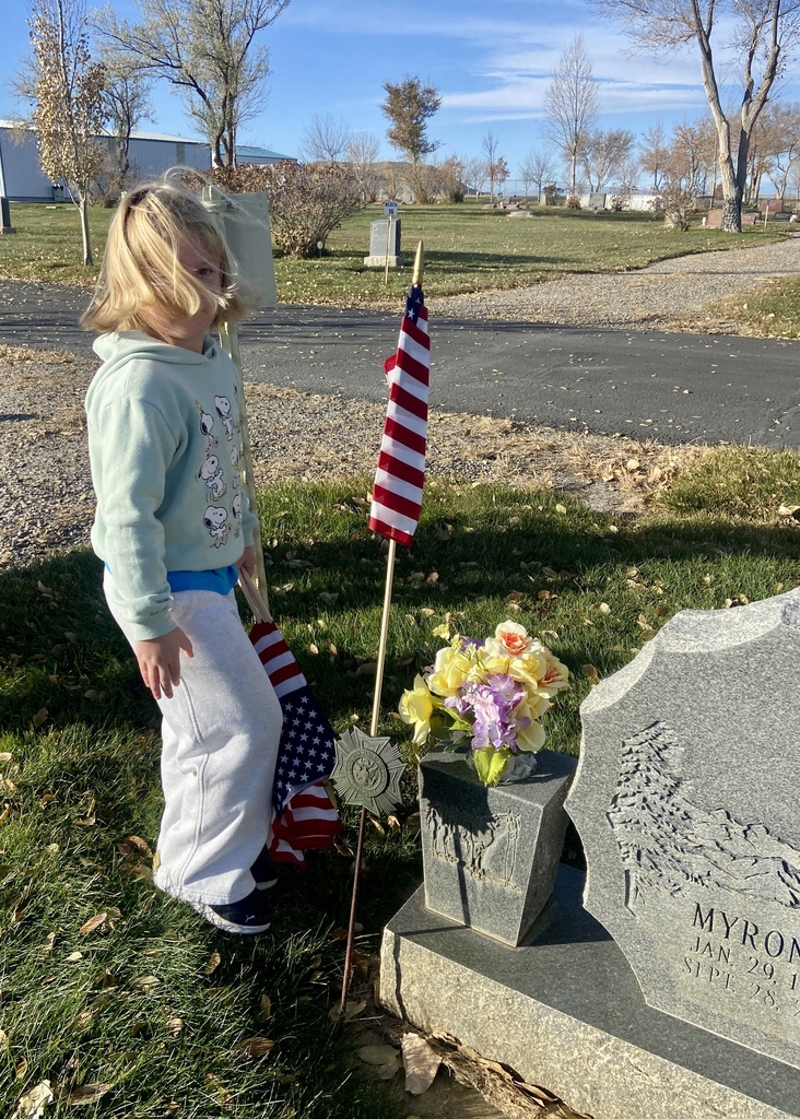 First Graders Honoring our local veterans at the Shoshoni Cemetery
