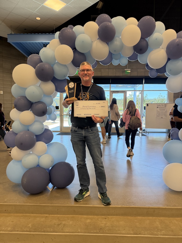 a photo for one of our staff members being recognized for an outstanding accomplishment