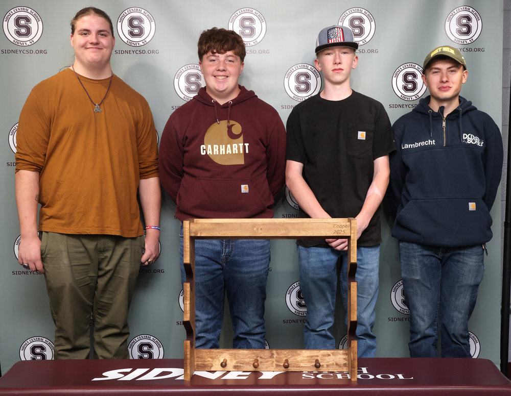 Four of the five students with the final product.