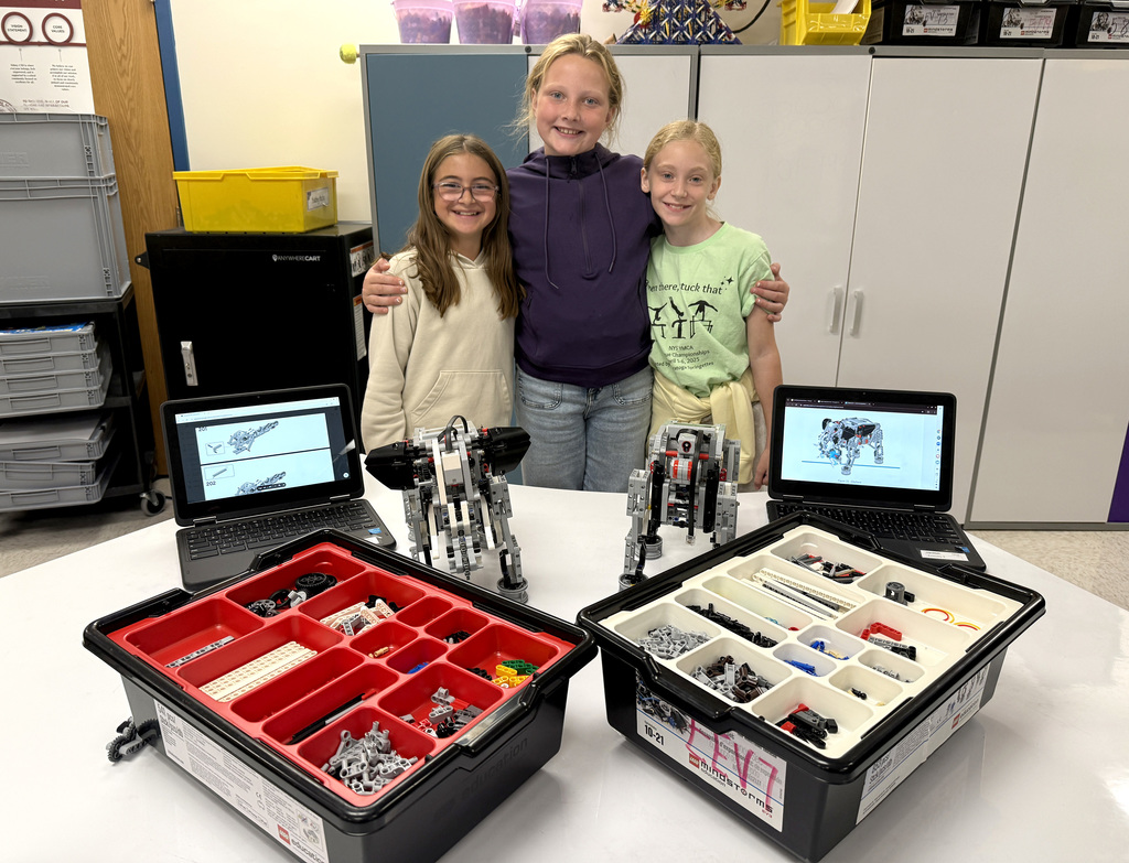 Three students who are working on an independent study in STEM/robotics