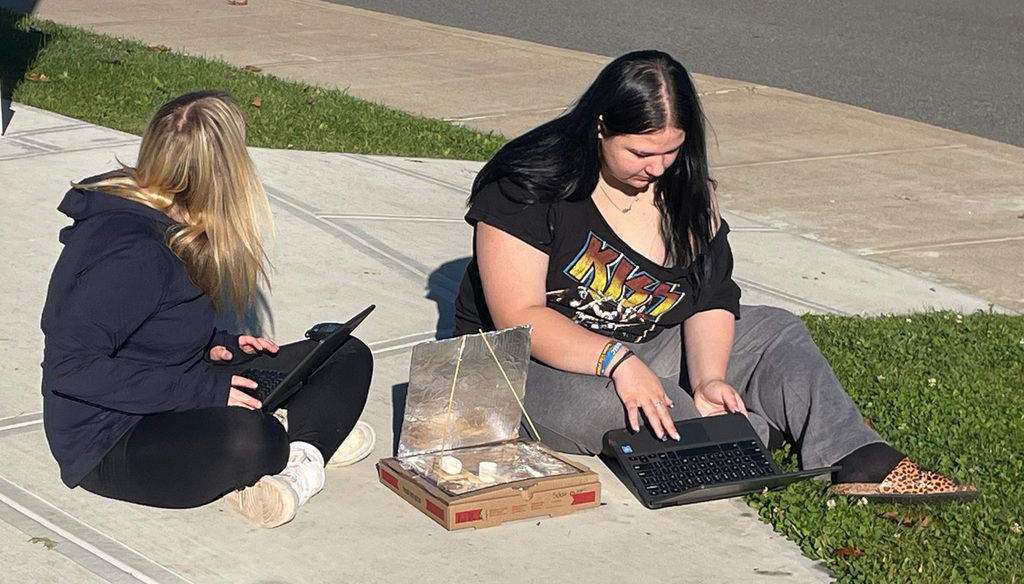 Students working on their solar oven project. 