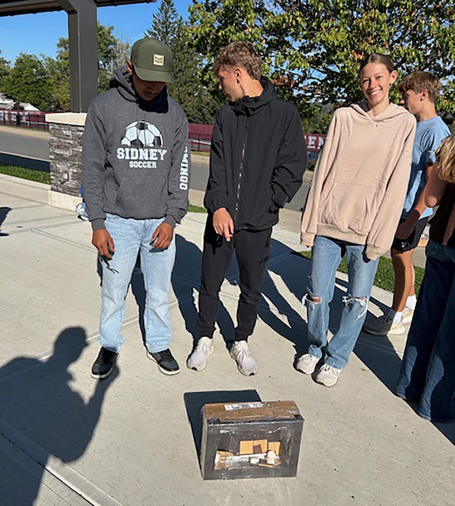 Students working on their solar oven project. 