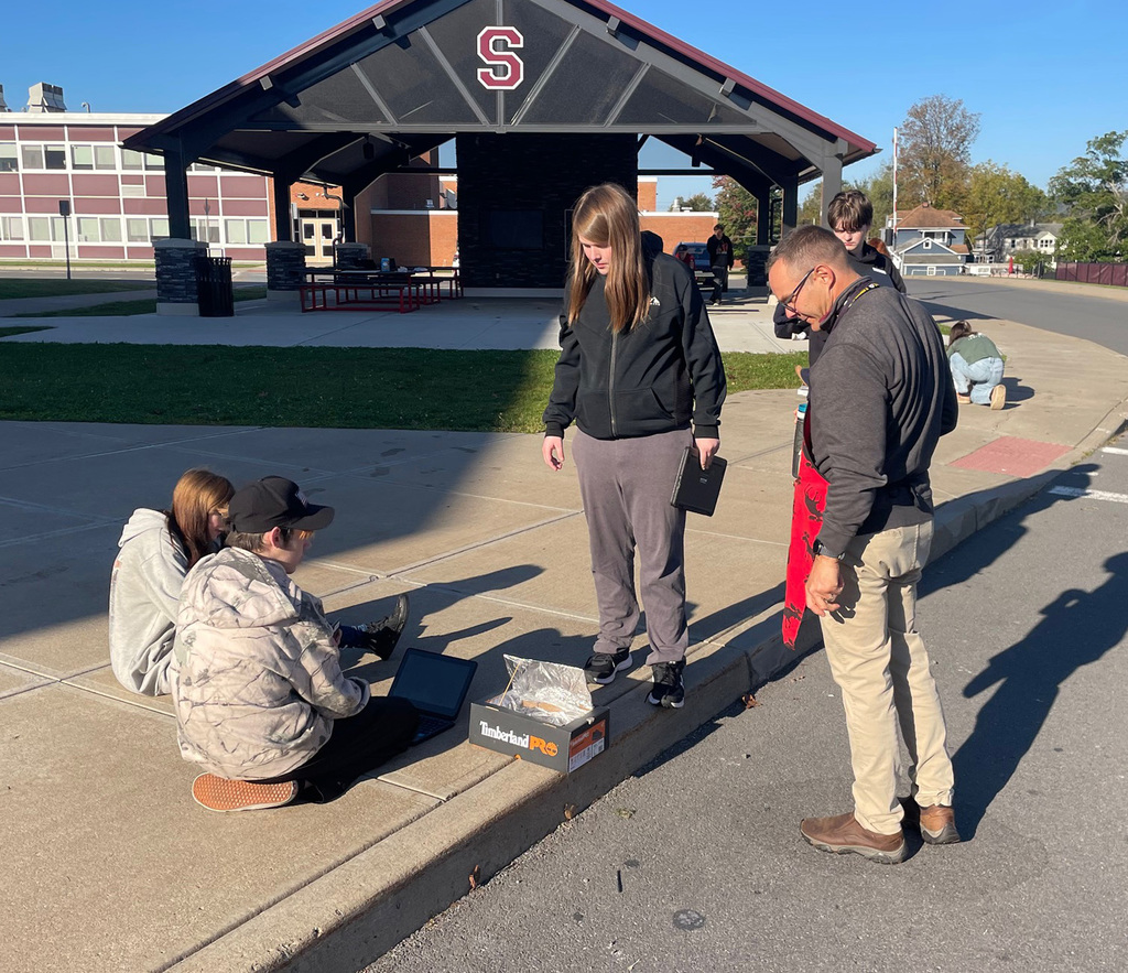 Students working on their solar oven project. 