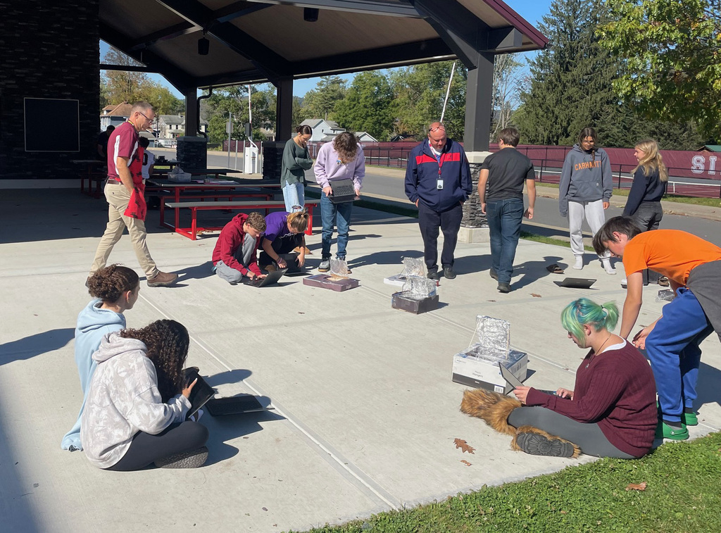 Students working on their solar oven project. 
