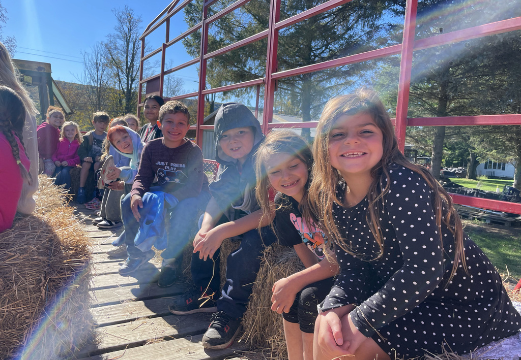 Students on a trip to Covered Bridge Farm