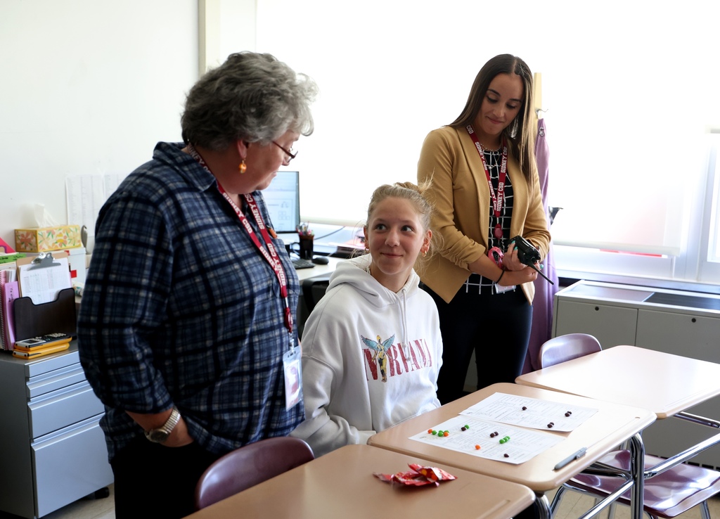 Students working in personal finance class 