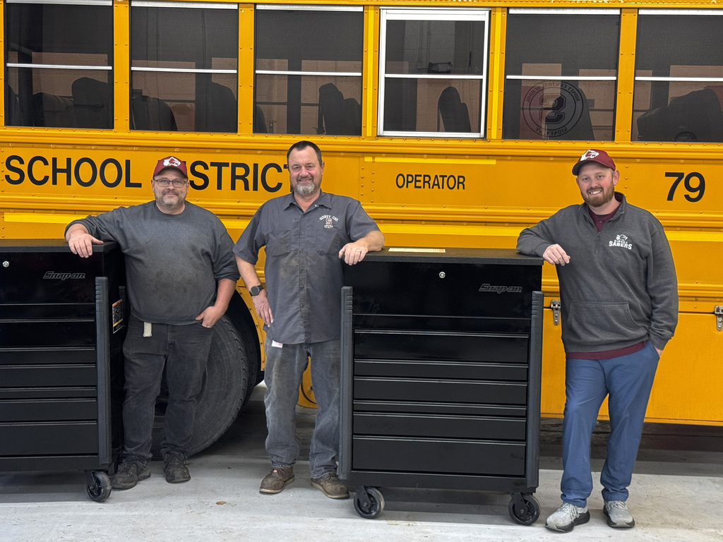 Jim Button, Mark Hotaling, and Brian Knapp with the new tool sets.