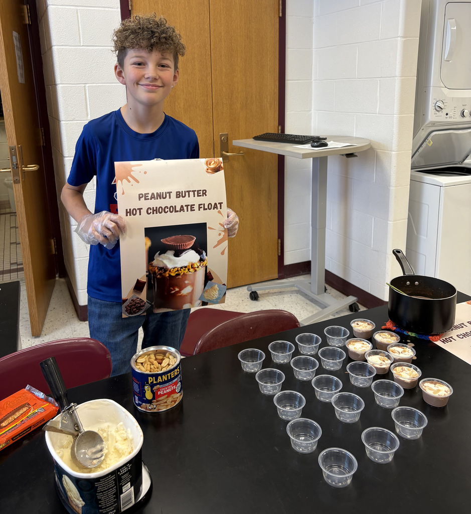 Students showing their hot chocolate project