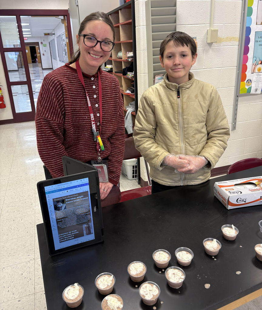 Students showing their hot chocolate project