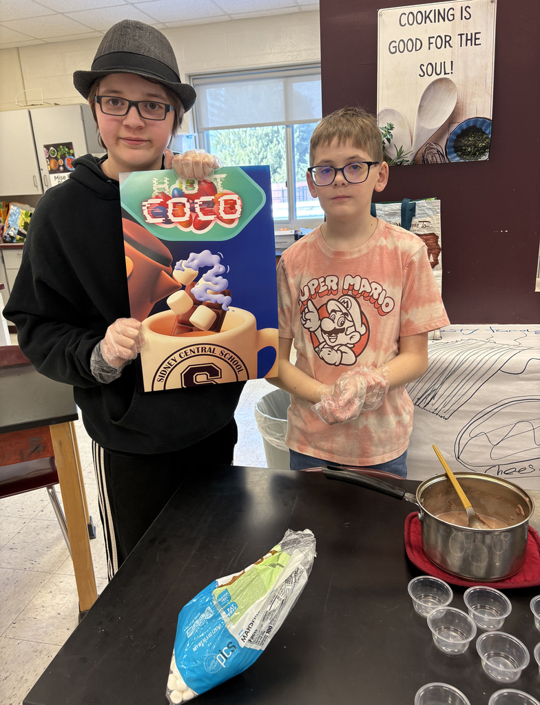 Students showing their hot chocolate project